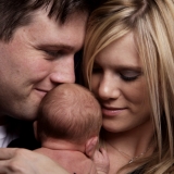 Man_and_woman_with_baby-825x510